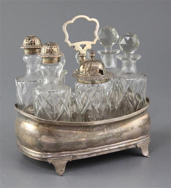 A George III silver shaped oval boat shaped cruet stand, 19.5cm.